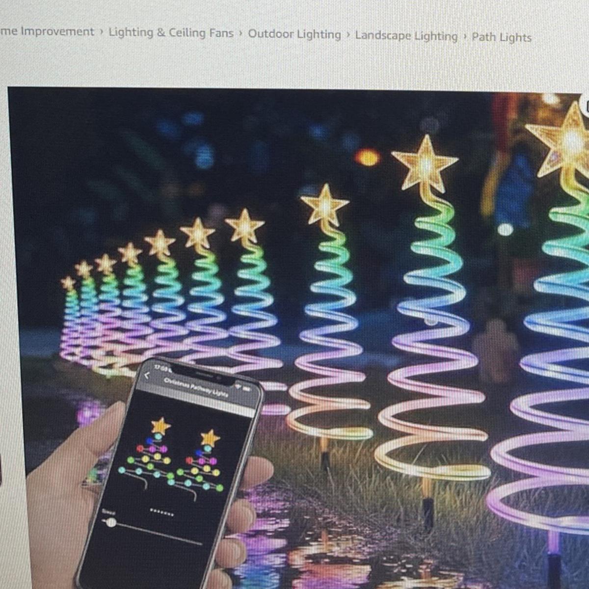 Ten RGBW spiral Christmas pathway lights with star toppers