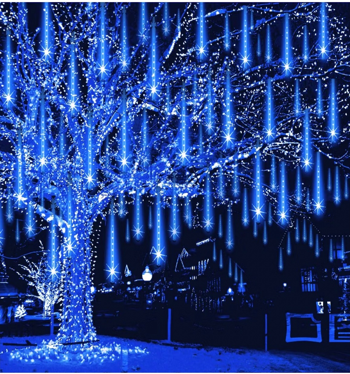 Blue Weepong meteor shower lights hanging from snow-covered trees