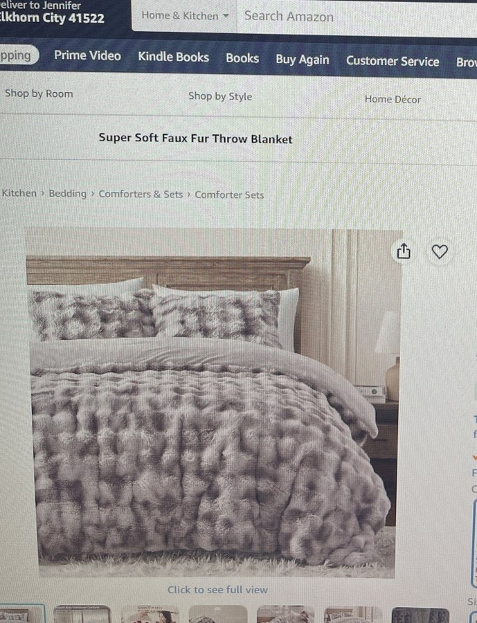 Brown WDCOZY fluffy faux rabbit fur comforter on a bed