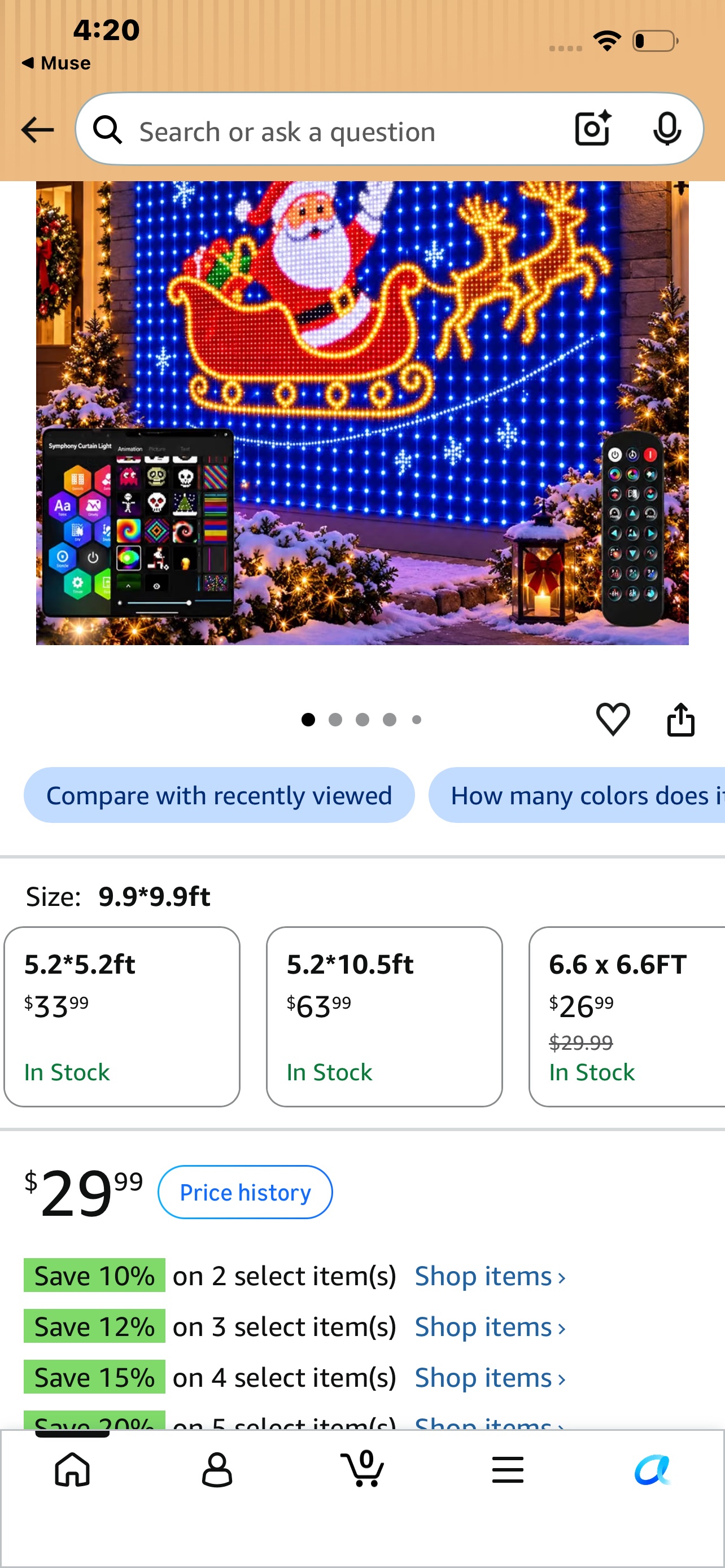 Christmas LED curtain light showing Santa in his sleigh with reindeer against a blue snowflake background